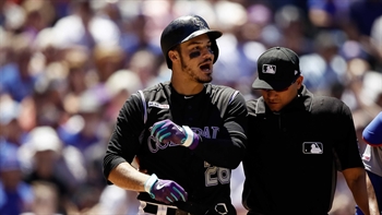 Was Cole Hamels out of line throwing at Nolan Arenado?