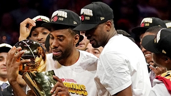 Cris Carter thinks Kawhi should sign with the Lakers... he wants to win championships