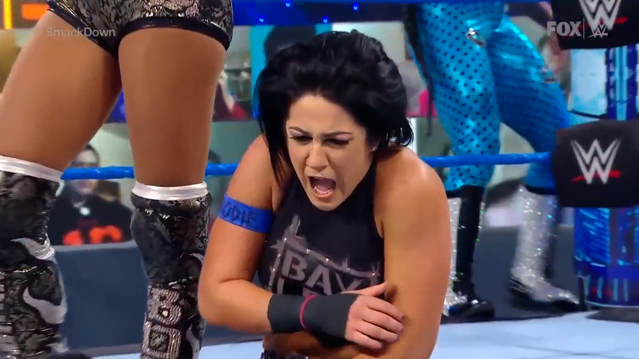 Sasha Banks and Bianca Belair face Bayley and Carmella