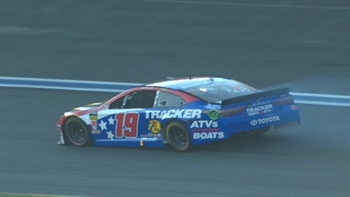 Leader Martin Truex Jr. hits the wall early in the Coca-Cola 600