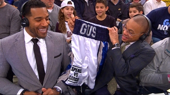 PBC gifts Gus Johnson a custom pair of boxing shorts