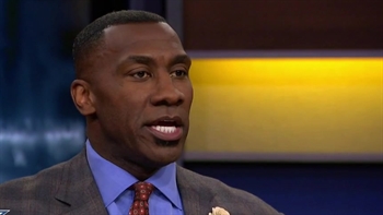 The Dallas Cowboys train runs by the conductor which is one Ezekiel Elliott