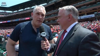 Blues coach Craig Berube enjoys the Cards game between Stanley Cup games