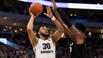 Marcus Howard leads No. 16 Marquette past Xavier with 26 points