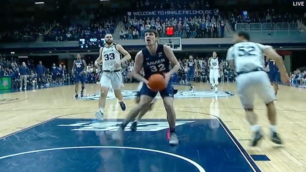 Zach Freemantle shoes off the handles on a fast break opportunity, puts down powerful jam