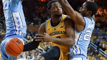 Michigan upsets No. 6 North Carolina in Juwan Howard's rematch of the '93 championship, 73-64