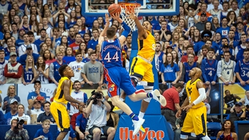 No. 13 Kansas puts together late run to top No. 20 West Virginia 77-69