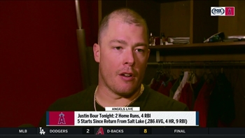 Justin Bour is happy to be back