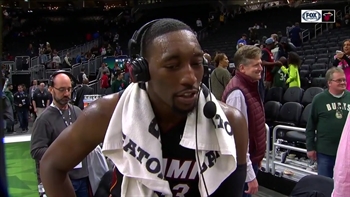 Bam Adebayo reacts to Heat's OT win in Milwaukee