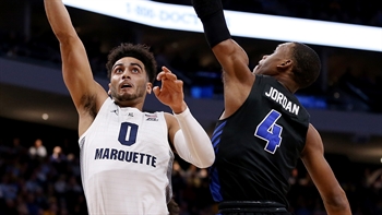 Markus Howard's 45 points lead No. 20 Marquette past No. 14 Buffalo 103-85