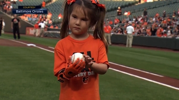 5-year-old Hailey Dawson throws first pitch with custom prosthetic hand
