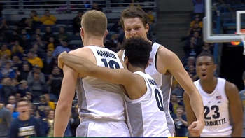 Marquette hangs tough to beat Vermont 91-81
