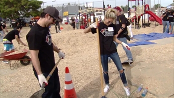 Coyotes help build playground