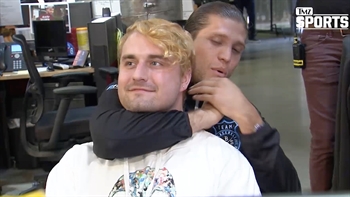 UFC fighter Brian Ortega demonstrates a choke hold on a TMZ employee | TMZ SPORTS