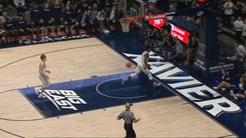 Tyrique Jones hits JP Macura with the behind the back pass to finish a wild exchange for Xavier