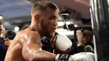 Conor McGregor vs. Floyd Mayweather fight approved for 8-ounce gloves