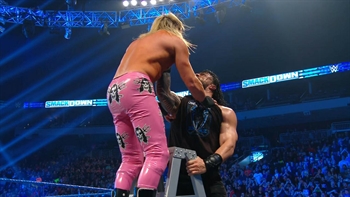 Roman Reigns breaks up match between King Corbin and Kofi Kingston