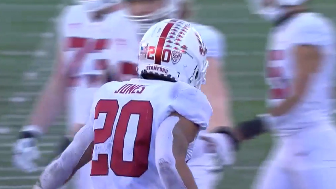 Austin Jones leaps into the end zone extending Stanford's lead over Washington, 14-0