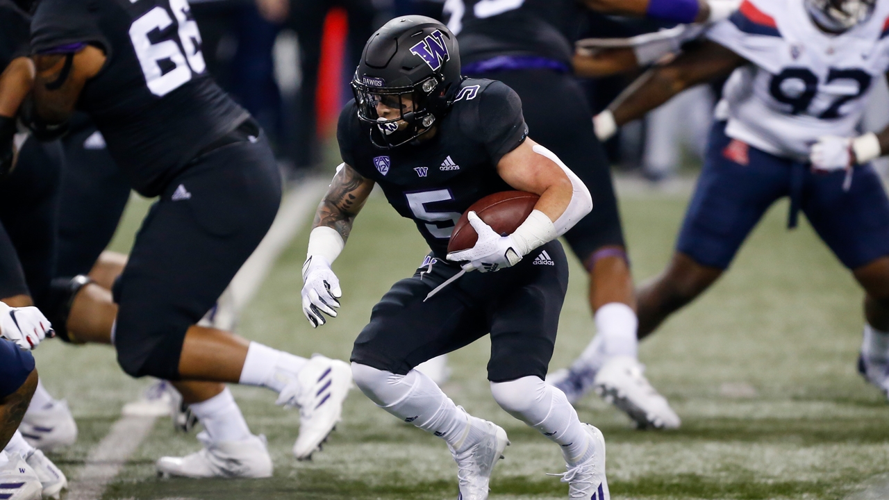 Washington racks up 235 rushing yards, four TDs in 44-27 win over Arizona