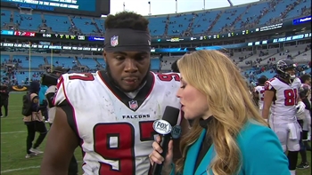 Falcons DT Grady Jarrett talks to Jennifer Hale after Atlanta's win in Carolina