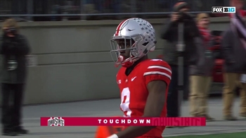 Buckeyes rolling as J.T. Barrett heaves a 48-yard TD pass to Binjimen Victor, Ohio State up 42-3