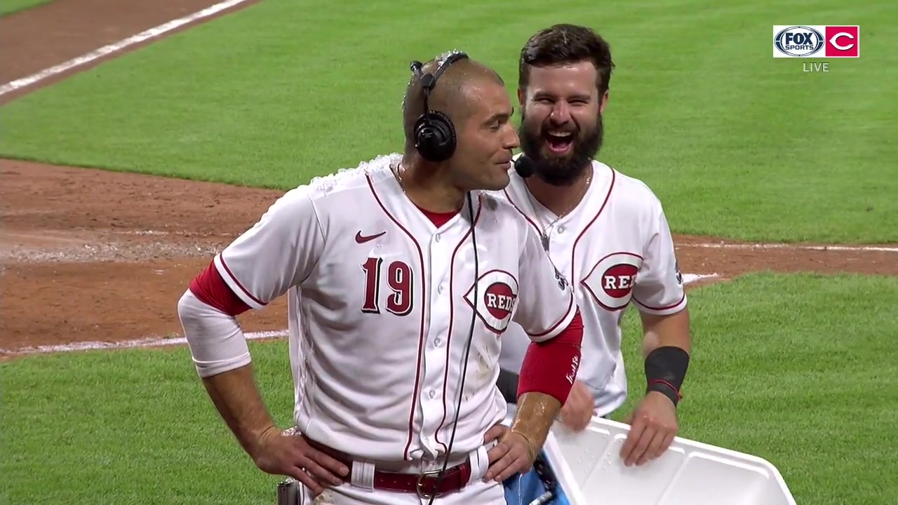 Jesse Winker crashes Joey Votto's walk-off interview