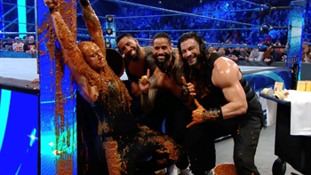 Roman Reigns gets revenge on King Corbin, dousing him with dog food after 6-man tag match
