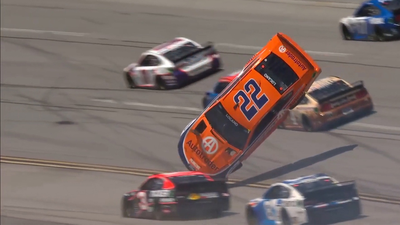 Joey Logano FLIPS his car after making contact with Denny Hamlin at Talladega
