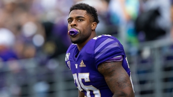 Salvon Ahmed reels off an 89-yard TD run to give Washington a 21-point lead