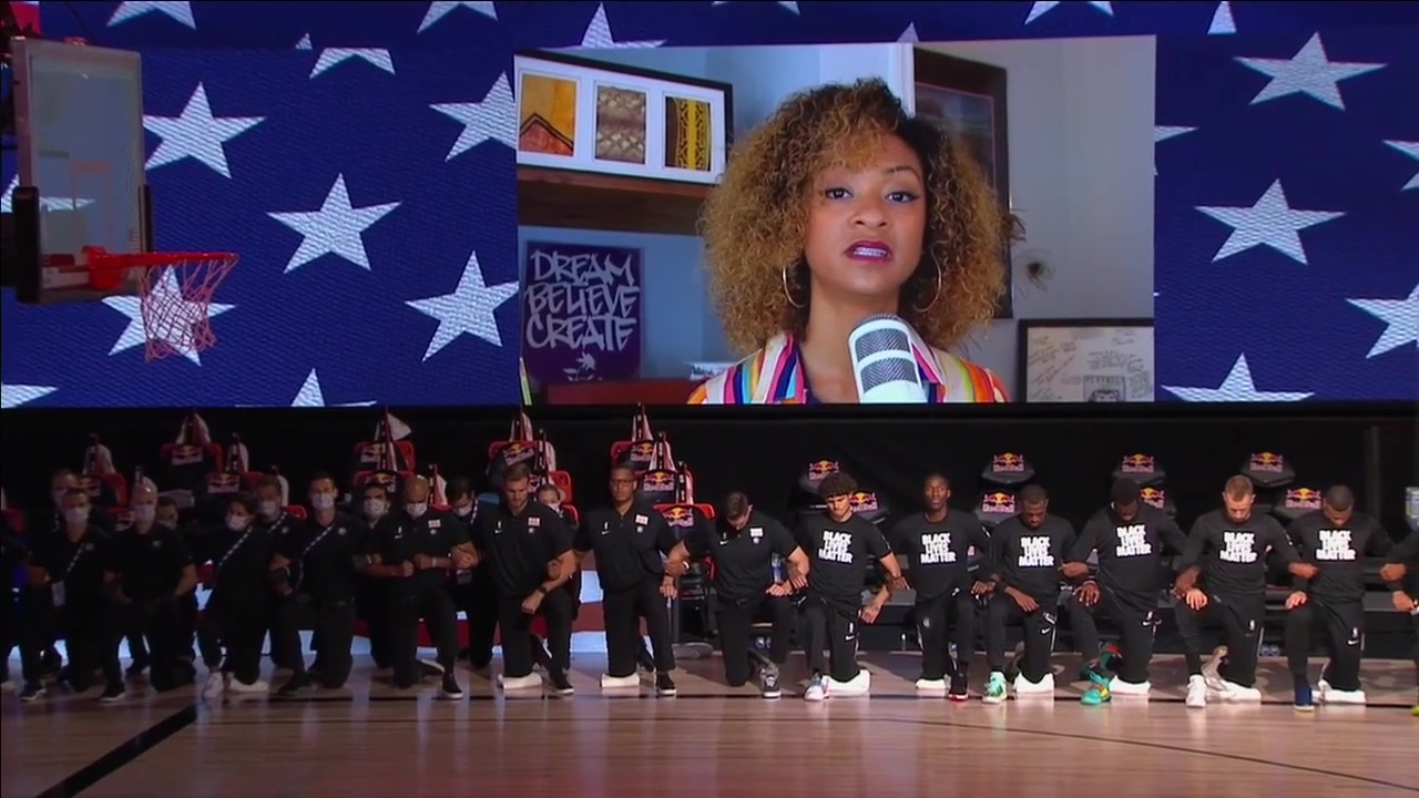 Magic, Nets kneel during National Anthem in 1st seeding game