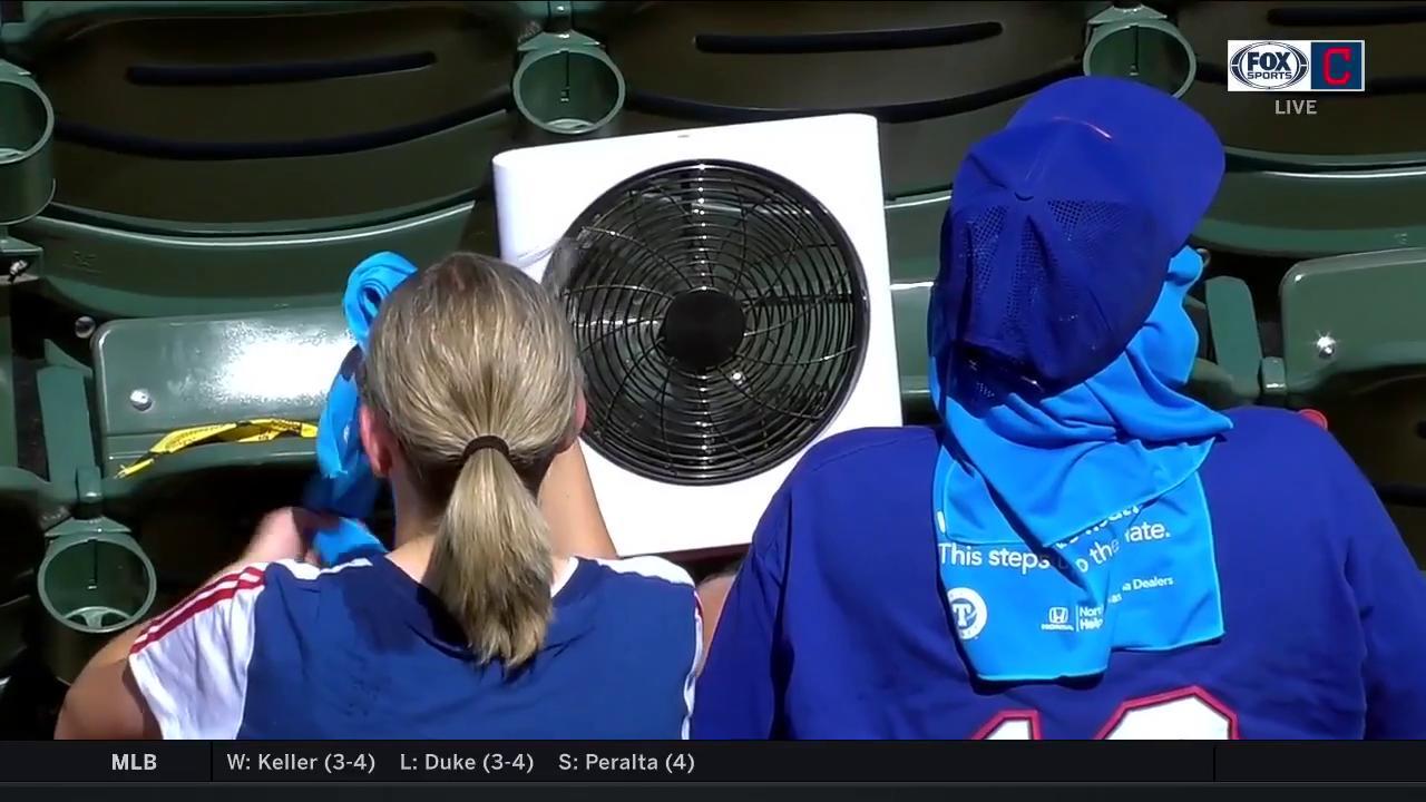 Sweltering day in Arlington forces fans, players to find ways to cool down